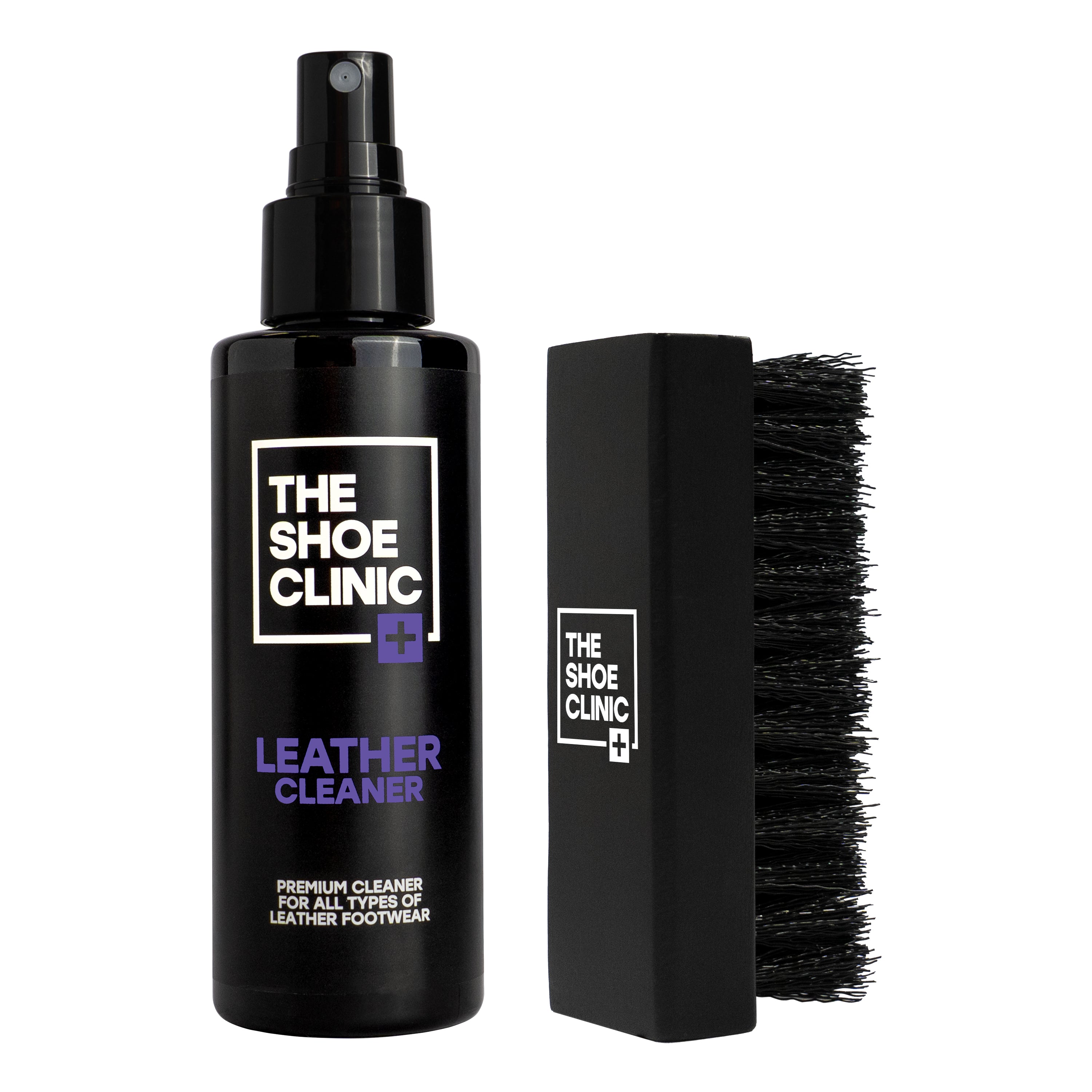 Black leather cleaner bottle and brush with 'The Shoe Clinic' branding on a white background